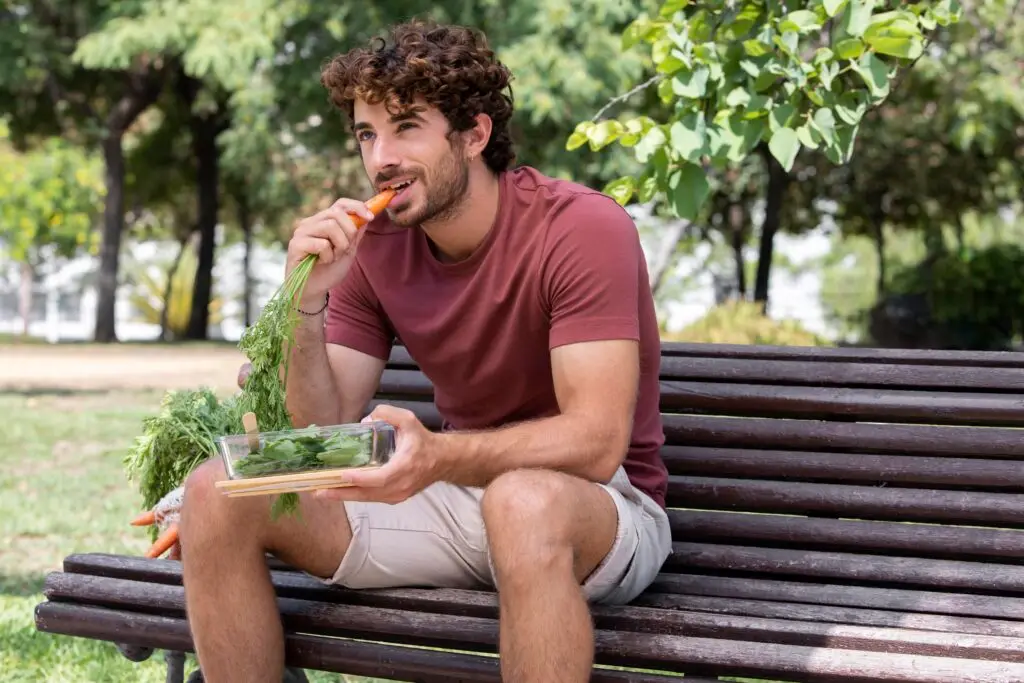 close up handsome man eating park Balanced Diet for weight loss